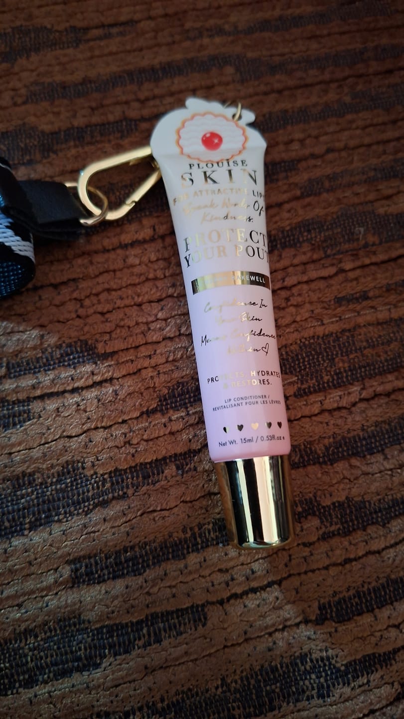 Customer photo review of Protect Your Pout Keychain Lip Conditioner