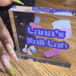 Customer photo review of Tabletop Business Logo Sign
