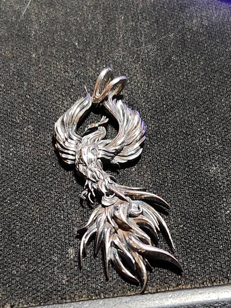 Customer photo review of Rising Phoenix Pendant