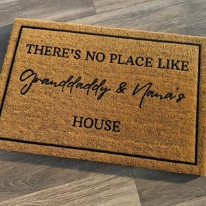 Customer photo review of There's No Place Like Nana's & Papa's House Doormat
