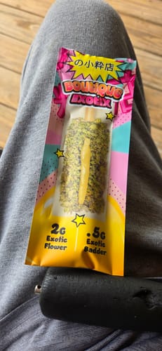 Customer's Boutique Exotics Jelly Roll pre-roll in its vibrant, colorful packaging featuring 2g flower and 0.5g badder.