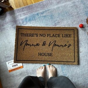 Customer photo review of There's No Place Like Nana's & Papa's House Doormat