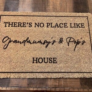 Customer photo review of There's No Place Like Nana's & Papa's House Doormat