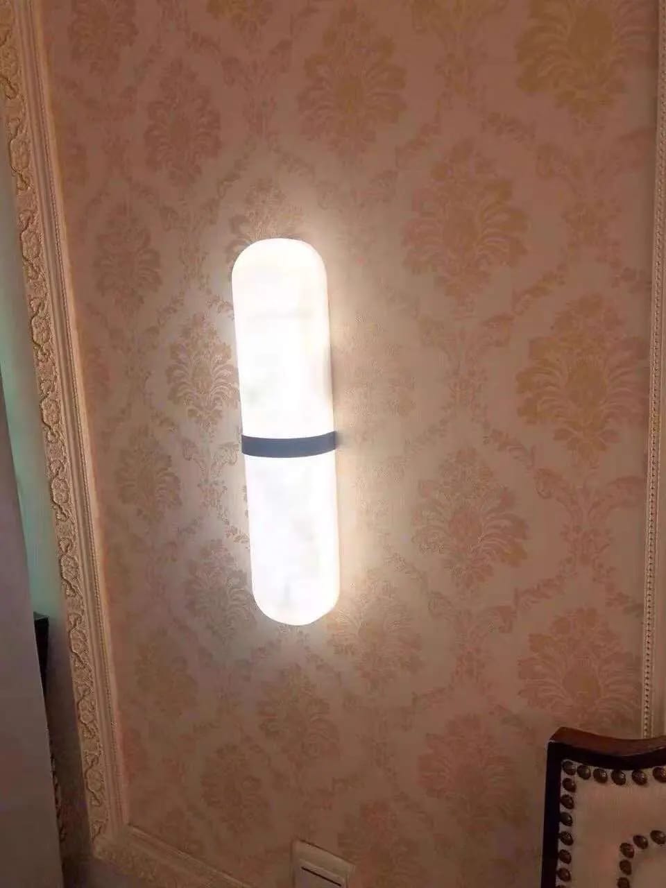 Customer photo review of Pill-Shaped Wall Sconce for Hallway, Alabaster, Brass