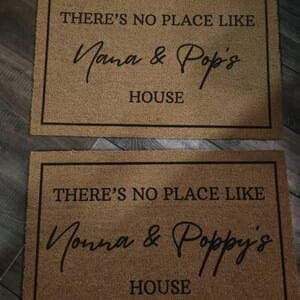 Customer photo review of There's No Place Like Nana's & Papa's House Doormat
