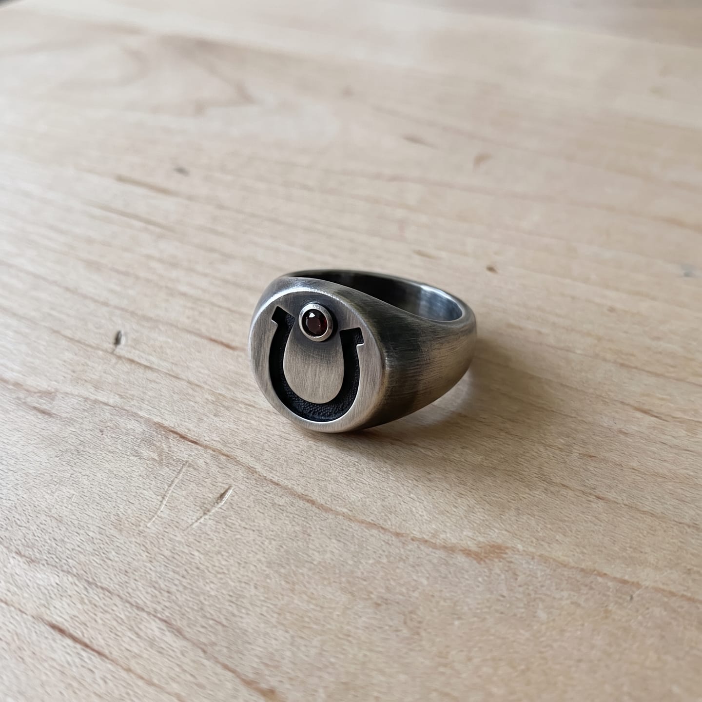 Customer photo review of Garnet Horseshoe Signet Ring