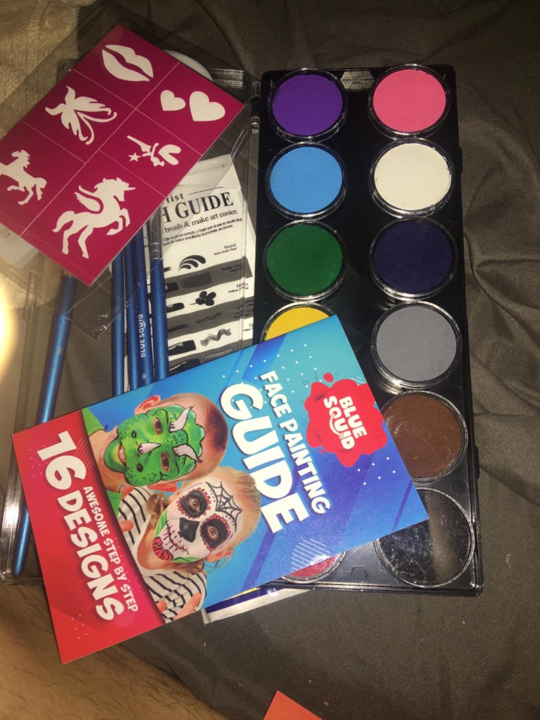 Customer photo review of Blue Squid Face Painting Kit for Kids – 60g/2.12oz Split Cake Face Paint Palette, One Stroke Rainbow Colors, with Brushes & Stencils - Non-Toxic, Water Activated - Kids Party & Halloween Makeup Kit
