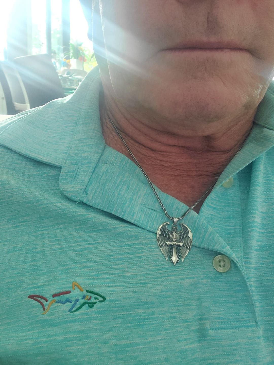 Customer photo review of Eagle Clutching Cross Pendant