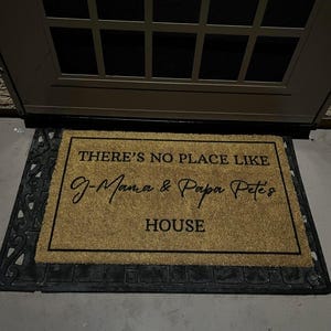 Customer photo review of There's No Place Like Nana's & Papa's House Doormat