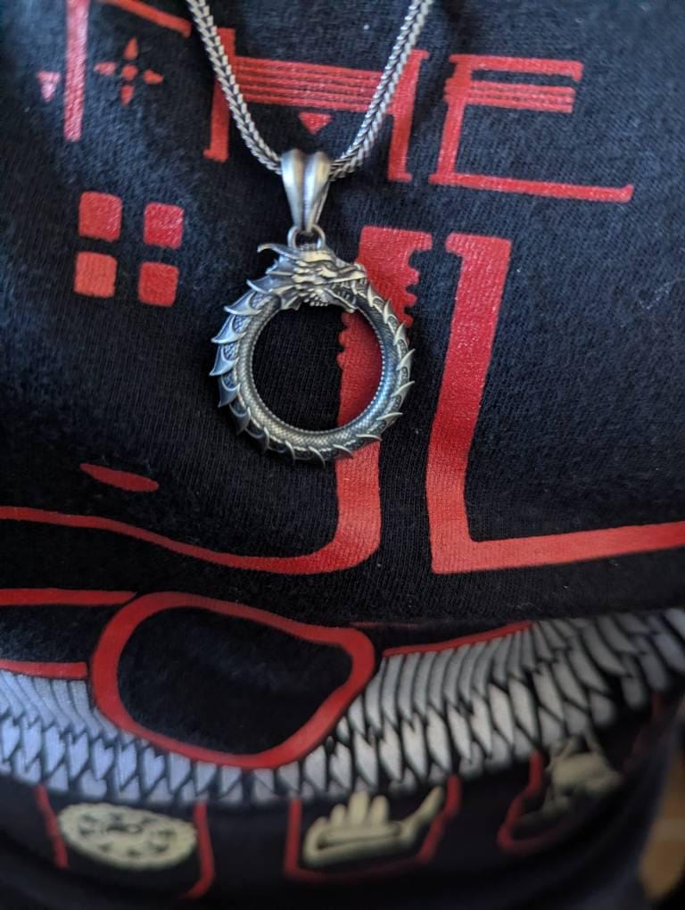 Customer photo review of Horned Ouroboros Dragon Pendant
