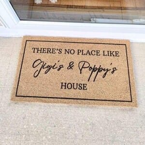 Customer photo review of There's No Place Like Nana's & Papa's House Doormat