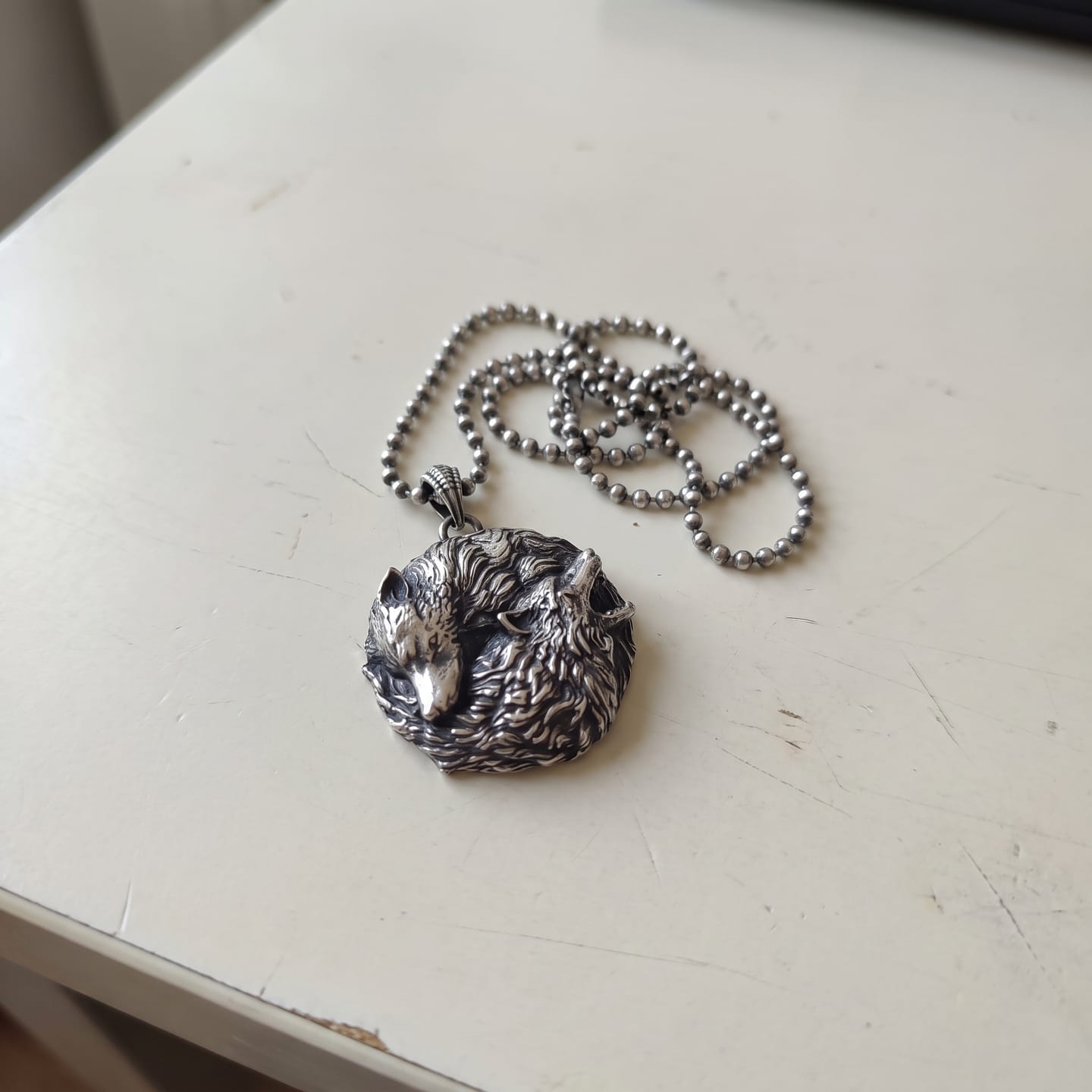Customer photo review of Dual Wolf Yin Yang Pendant