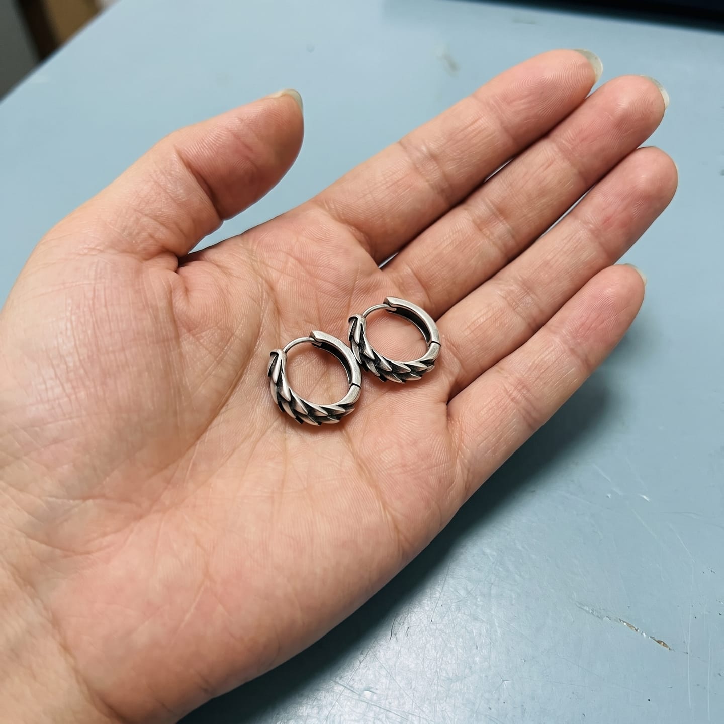 Customer photo review of Wedge Huggie Earring