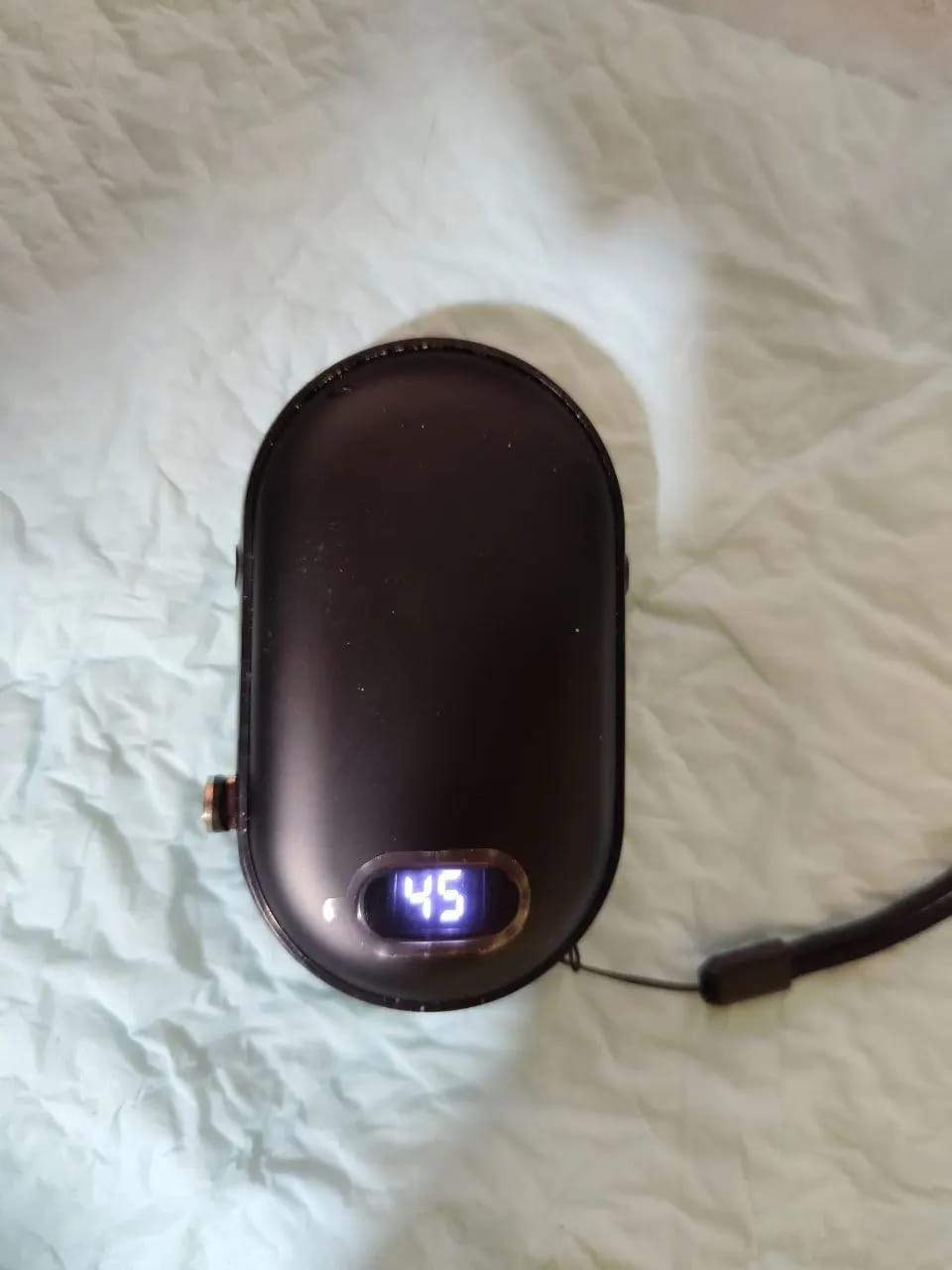 Customer photo review of Rechargeable Hand Warmer, Heats Both Sides