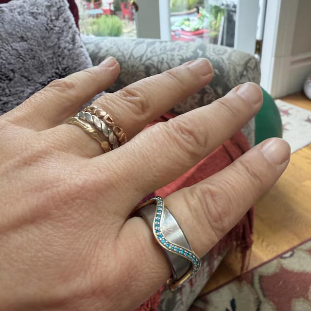 Customer photo review of Wavy Moissanite Oura Ring Cover Silver Ring Enhancer