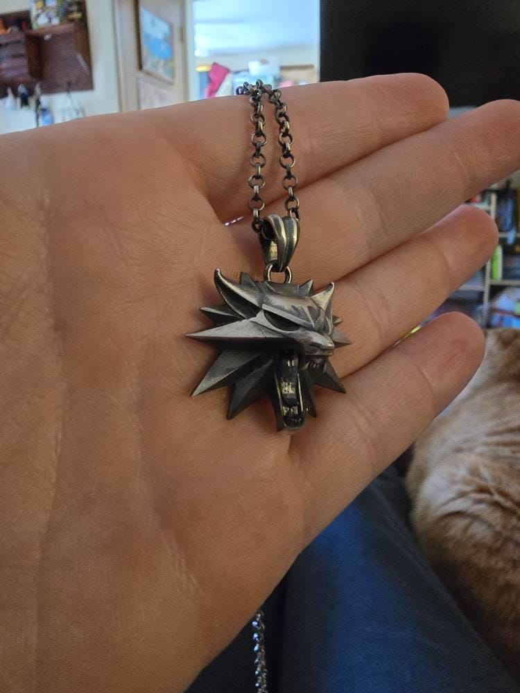 Customer photo review of Wolf School Emblem Pendant