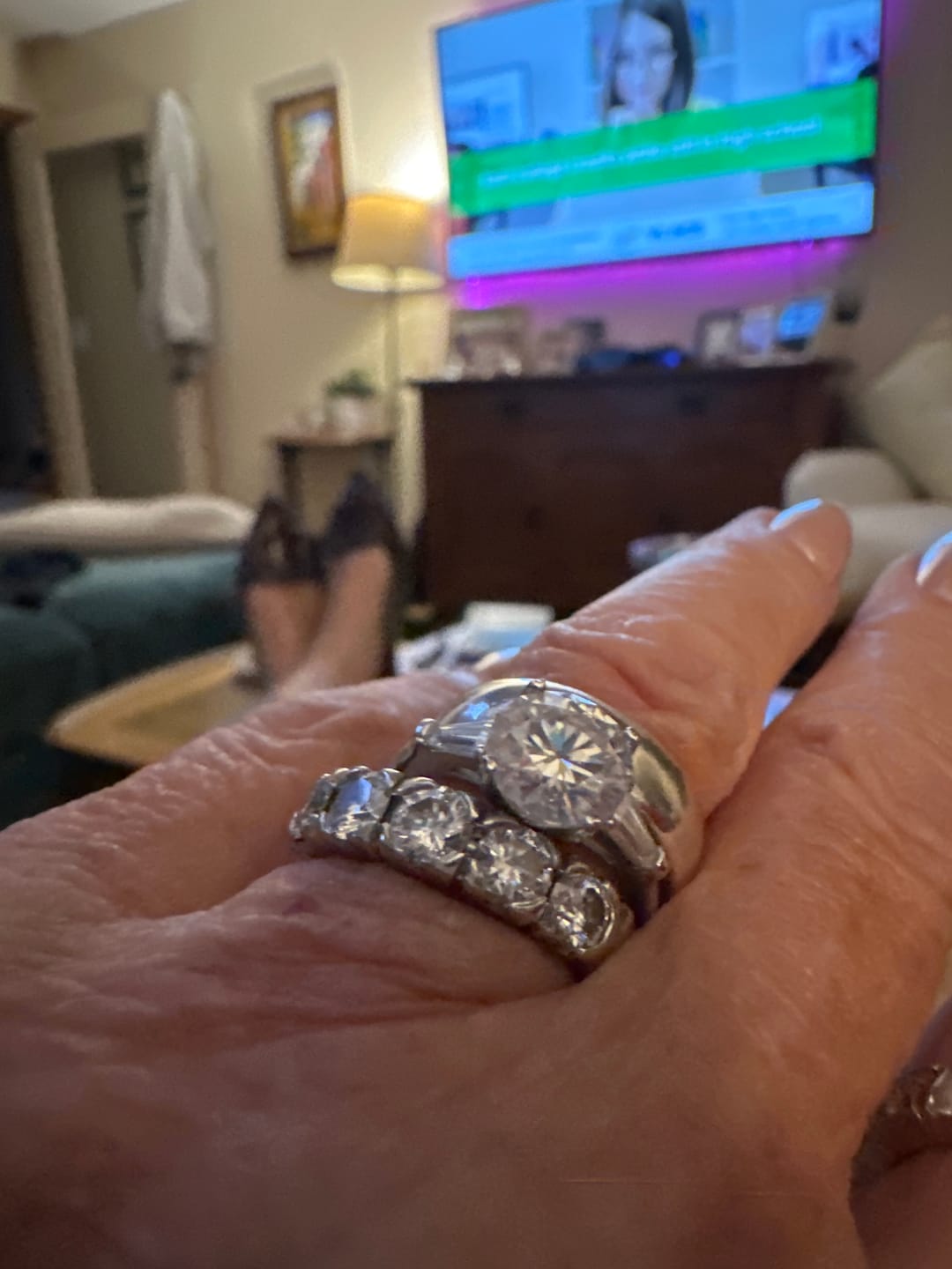 Customer photo review of Three Stone Round Moissanite Tapered Baguette Engagement Ring