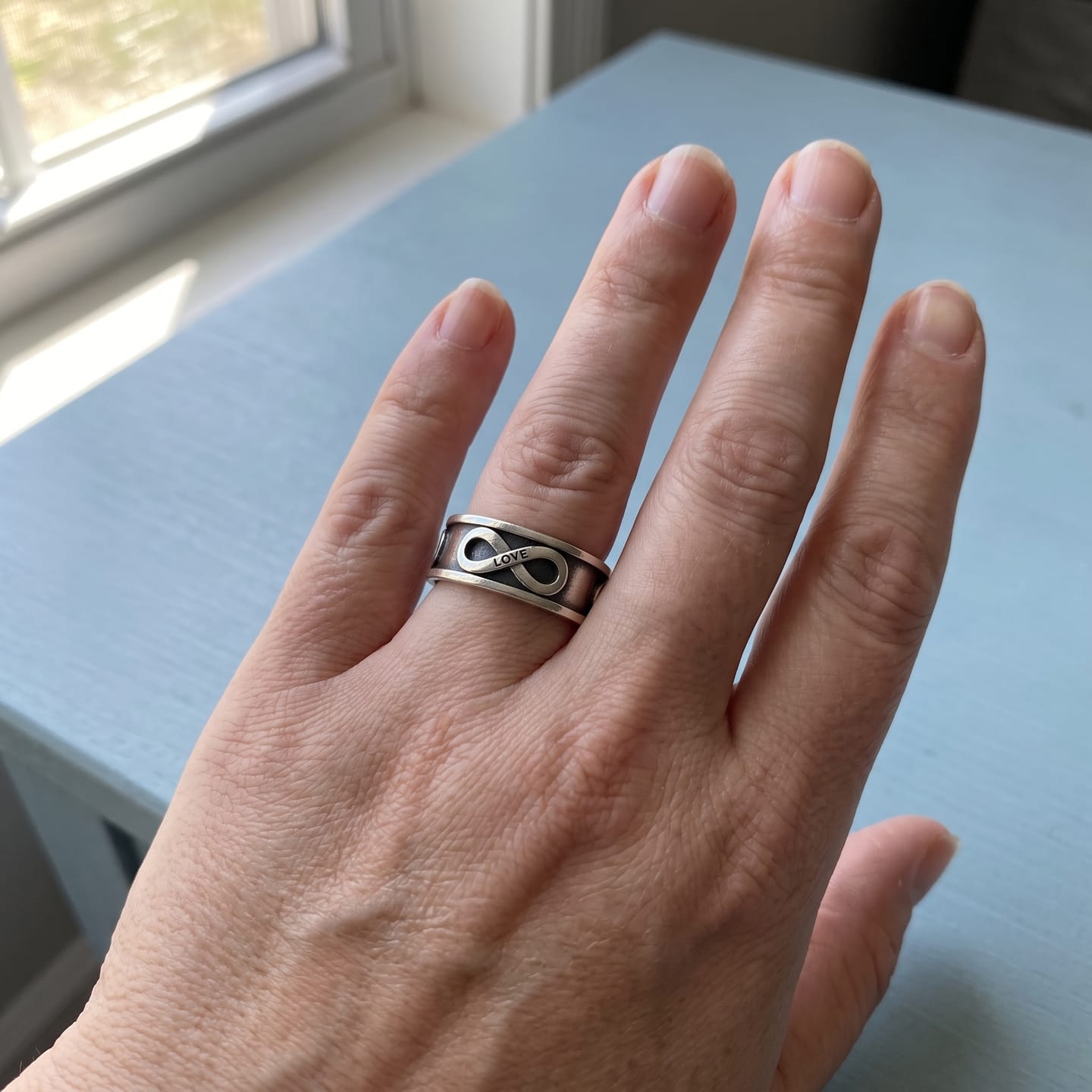 Customer photo review of Infinity Love Ring