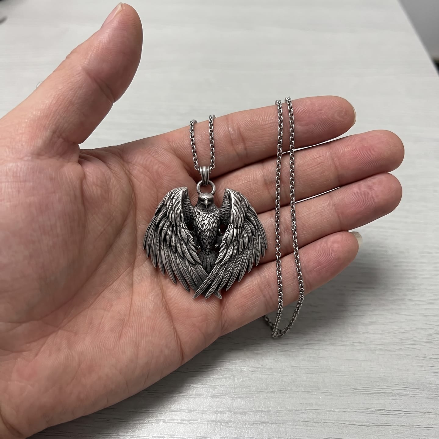 Customer photo review of Eagle Wings Pendant