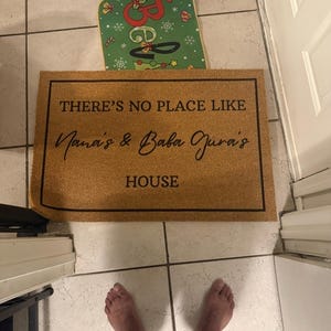 Customer photo review of There's No Place Like Nana's & Papa's House Doormat