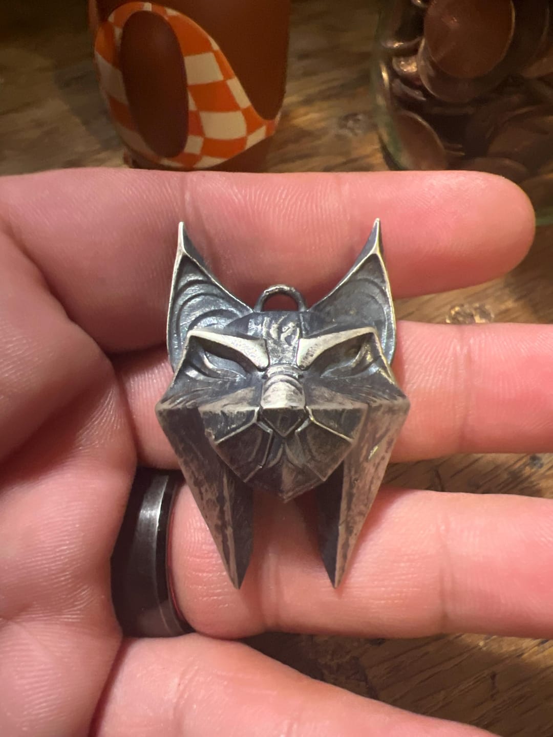 Customer photo review of Lynx School Medallion Pendant