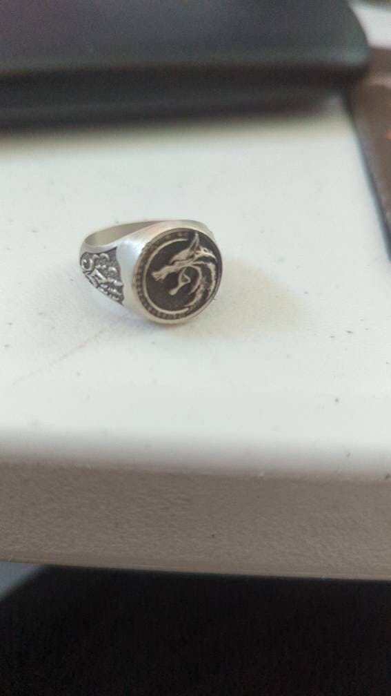 Customer photo review of Wolf School Medallion Ring