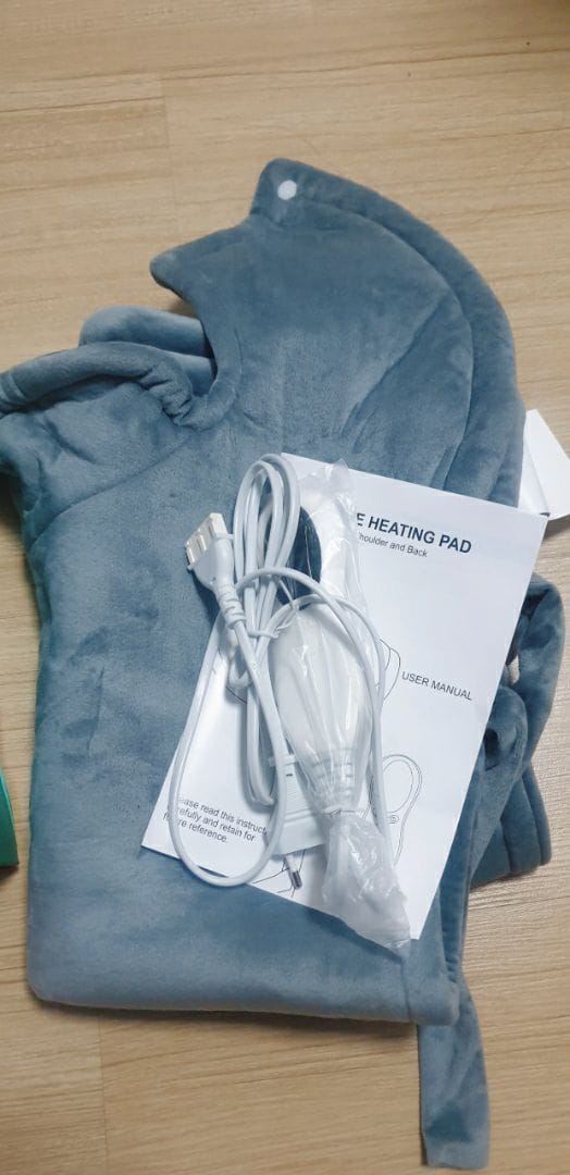 Customer photo review of Heated Shoulder and Neck Wrap