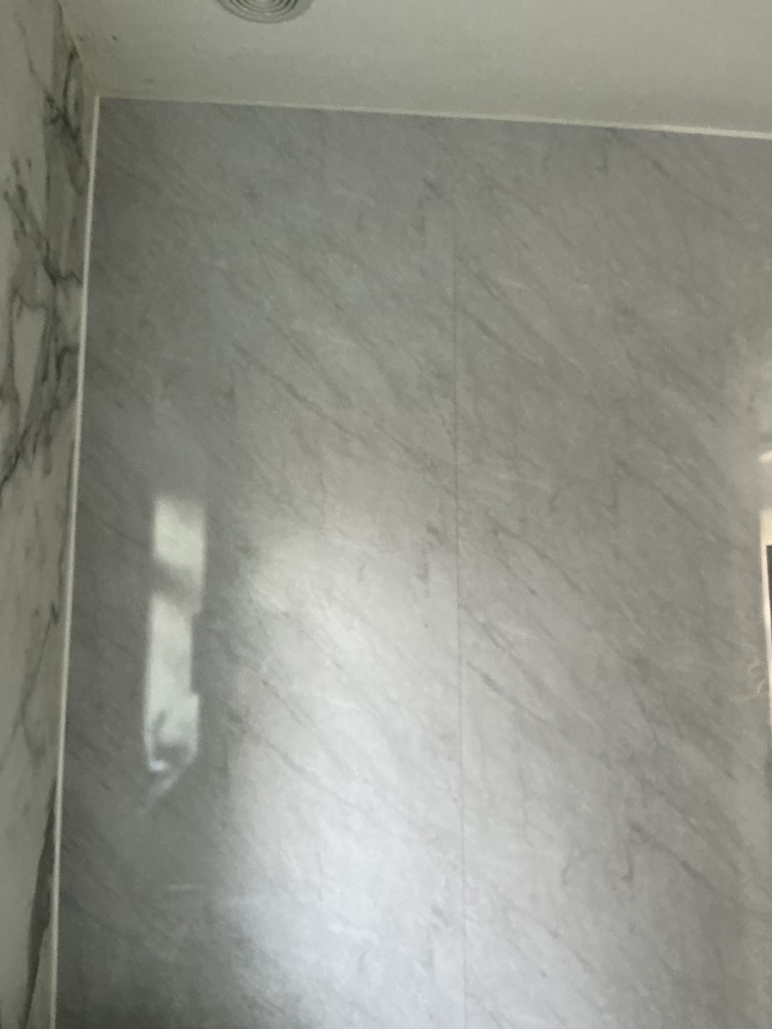 Customer photo review of Premium Grey Marble Gloss Shower Wall Panel – 1M x 2.4M