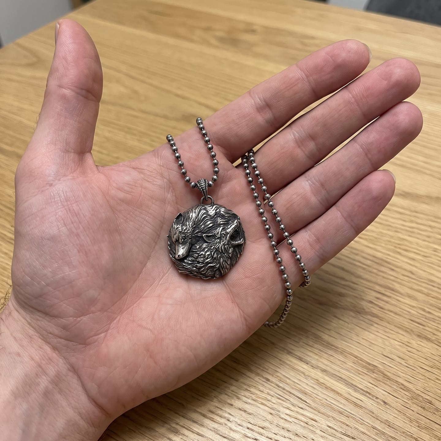 Customer photo review of Dual Wolf Yin Yang Pendant