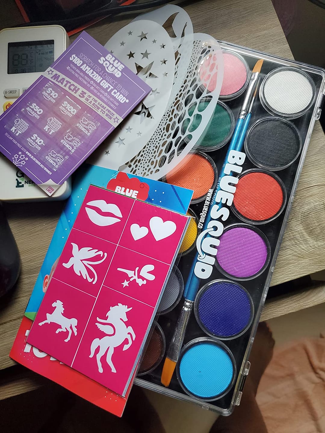 Customer photo review of Blue Squid Face Paint Stick - Water based Body Paint for Adults & Kids - Vegan Hypoallergenic Twist-Up Non-Toxic Makeup Stick for Cosplay, & SFX