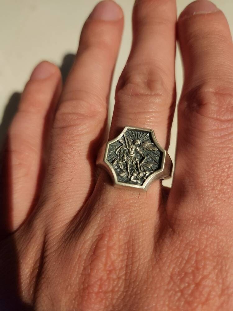 Customer photo review of Archangel Michael Defeating Satan Ring