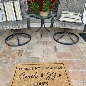 Customer photo review of There's No Place Like Nana's & Papa's House Doormat