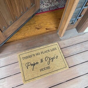 Customer photo review of There's No Place Like Nana's & Papa's House Doormat