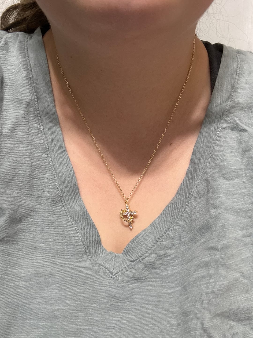 Customer photo review of Christianartworkshop Modern Crowned in Faith Cross Necklace, Earrings