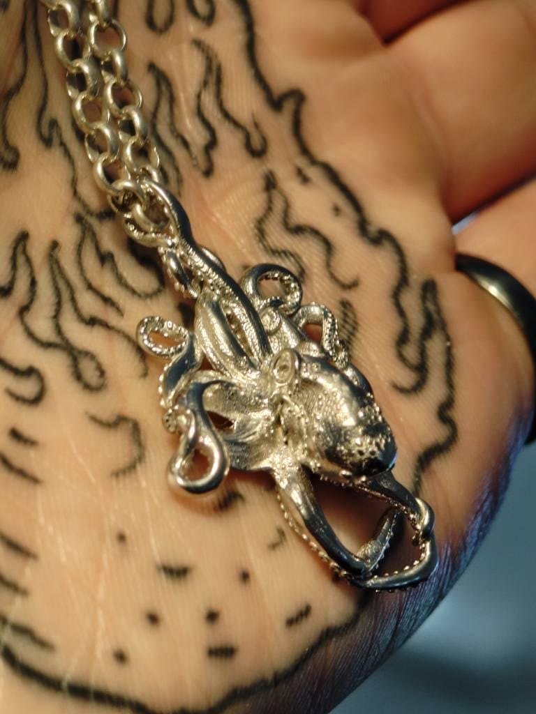 Customer photo review of Swirling Octopus Pendant