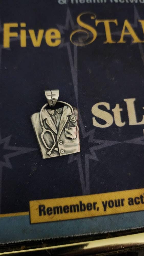 Customer photo review of Doctor Coat Pendant
