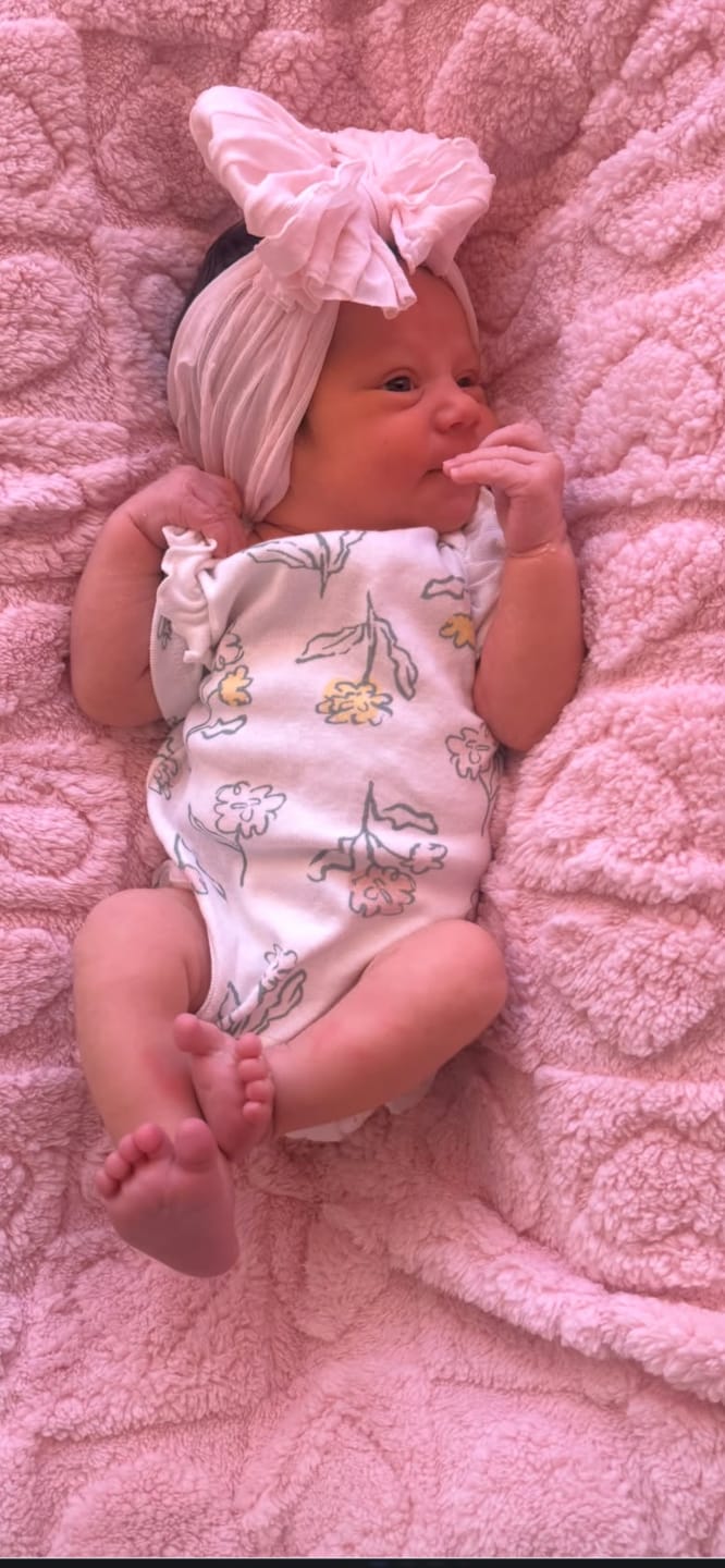 Customer photo review of Ivory | Signature Ruffled Baby Headband