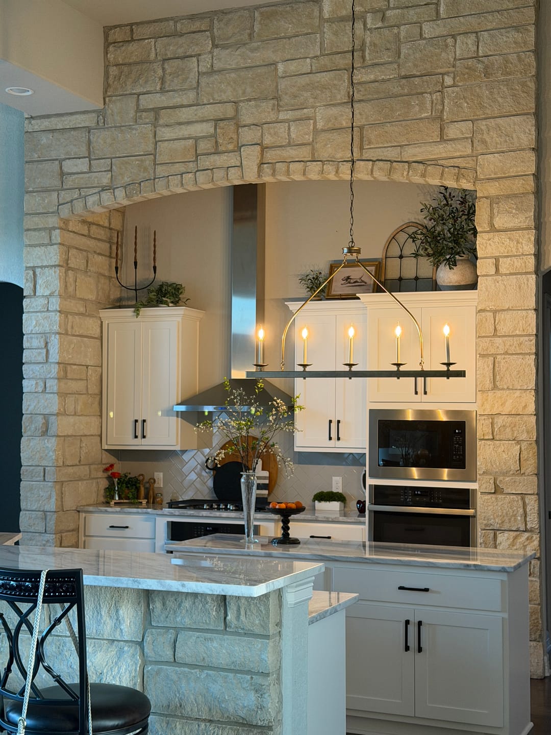 Customer photo review of 5-Light French Distressed Gold Candle Linear Island Chandelier