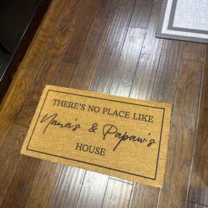 Customer photo review of There's No Place Like Nana's & Papa's House Doormat