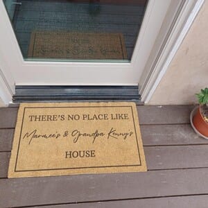 Customer photo review of There's No Place Like Nana's & Papa's House Doormat