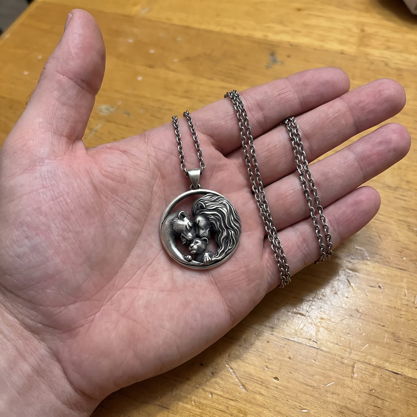 Customer photo review of Lioness and Cub Medallion Pendant
