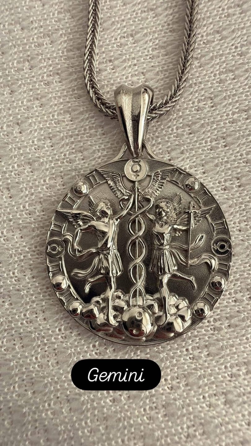 Customer photo review of Caduceus Gemini Zodiac Pendant