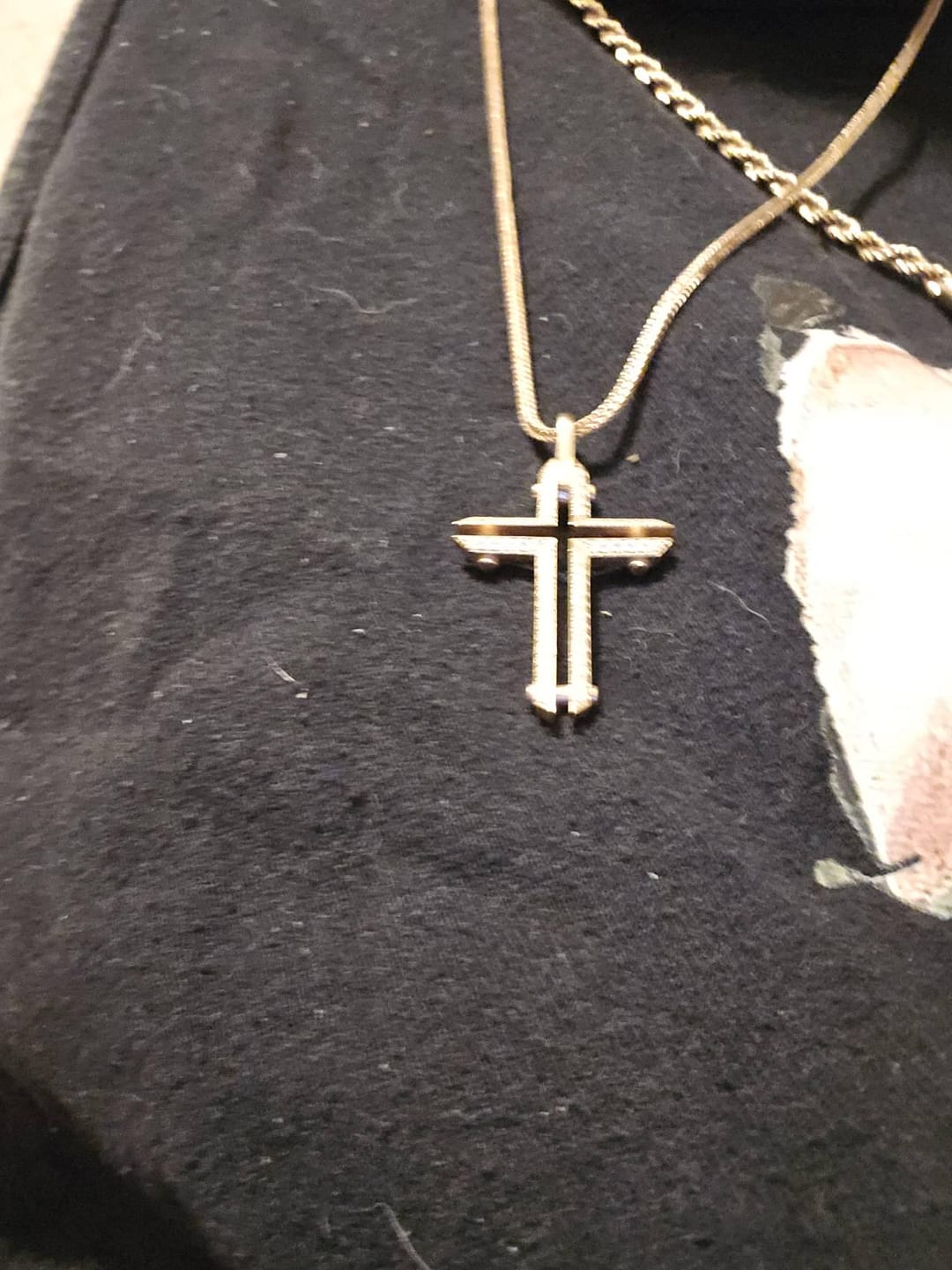 Customer photo review of Faceted Cross Pendant