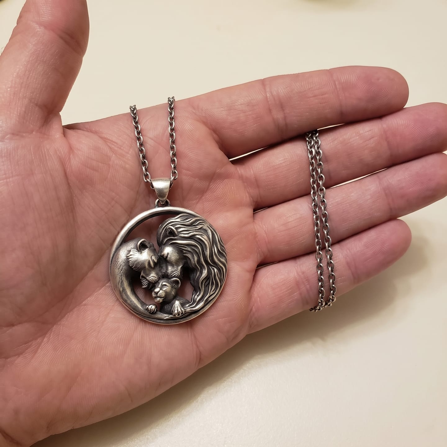 Customer photo review of Lioness and Cub Medallion Pendant