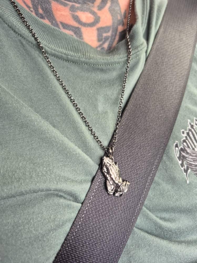 Customer photo review of Cuffed Praying Hands Pendant