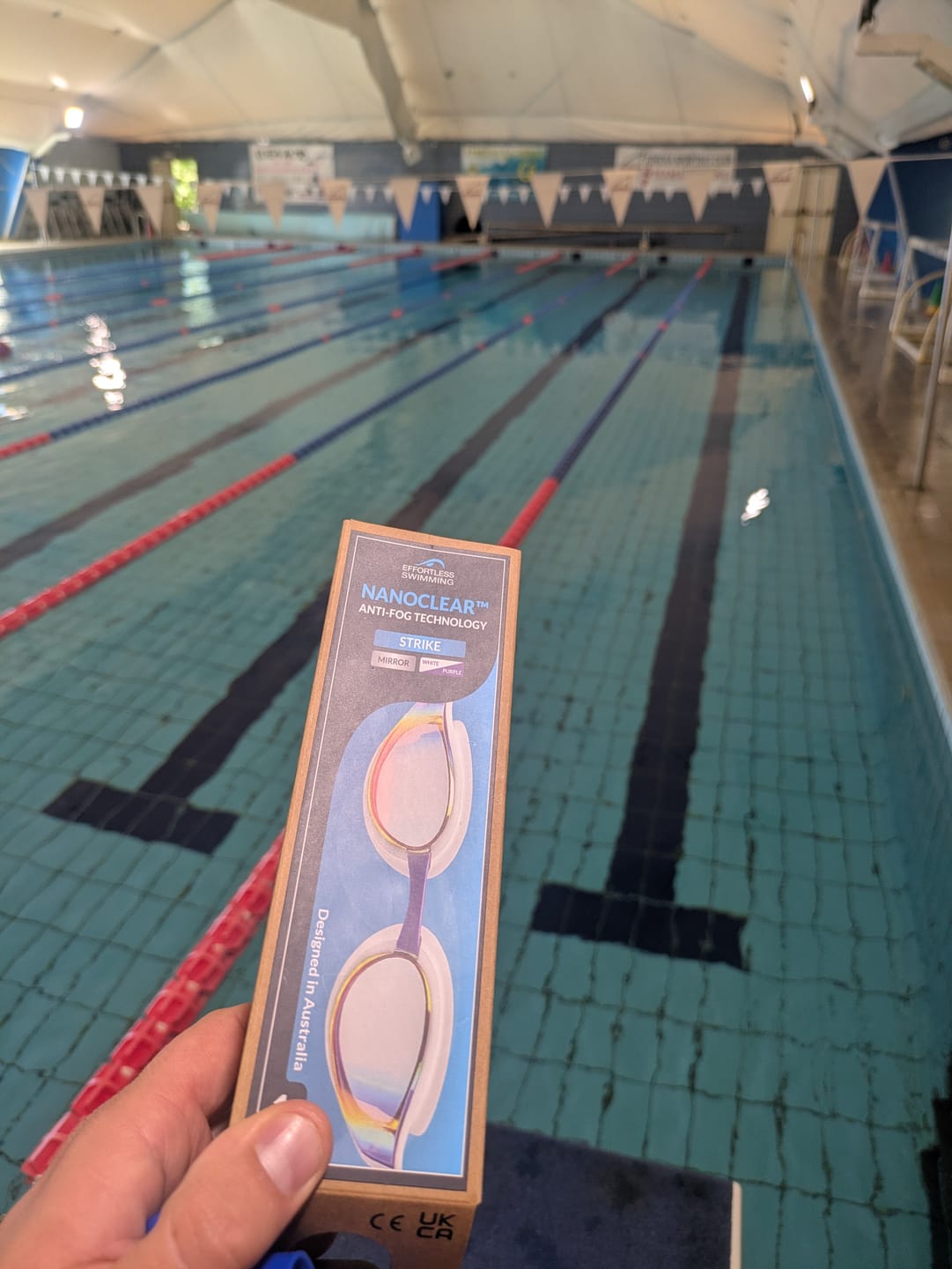 Customer photo review of NanoClear™ Strike Swim Goggles Sunrise Mirror - (White/Purple)