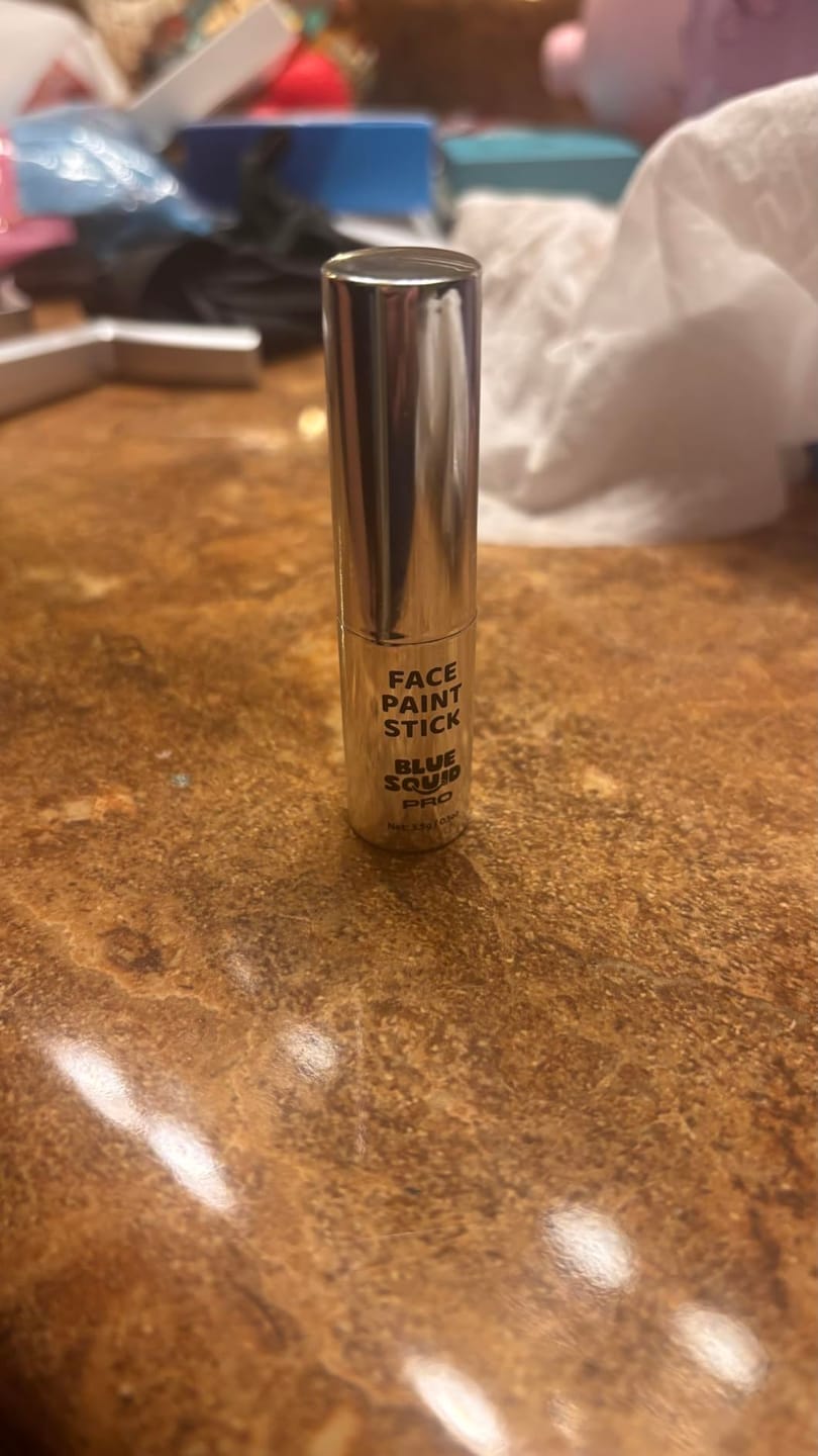 Customer photo review of Blue Squid Face Paint Stick - Water based Body Paint for Adults & Kids - Vegan Hypoallergenic Twist-Up Non-Toxic Makeup Stick for Cosplay, & SFX