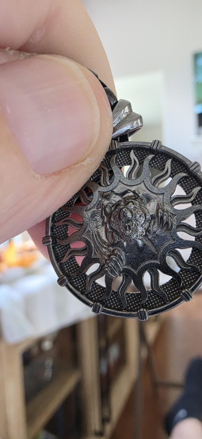 Customer photo review of Flame Border Grizzly Bear Pendant