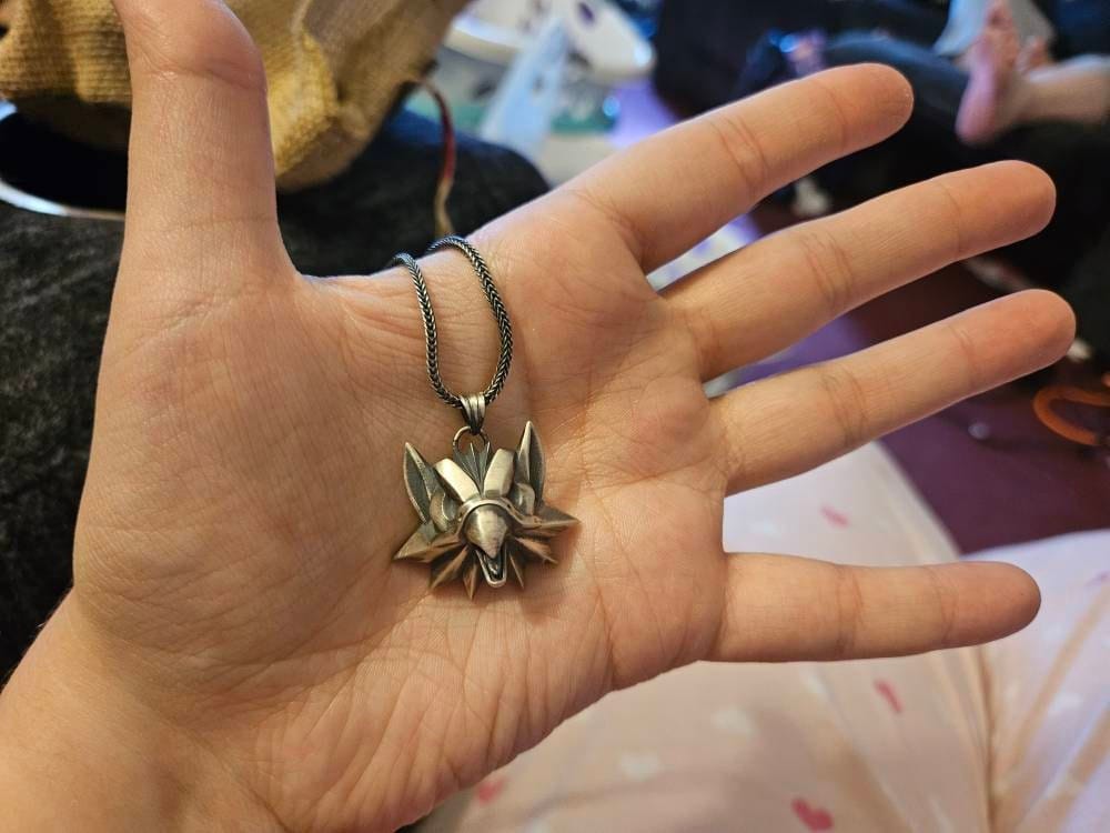 Customer photo review of Griffin School Medallion Pendant