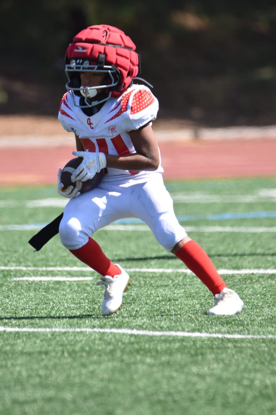 Customer photo review of Phenom Elite Quantum Carbon Football Cleats – Gold Rush (White & Gold)